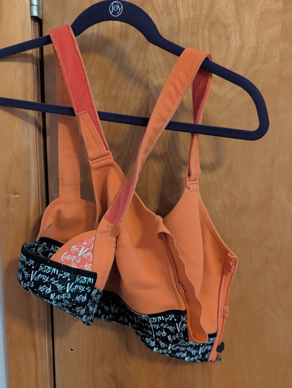 Orange Athletic Sports Bra with Black Script Band